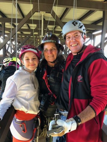 WWHS freshman Jamie Fazio, her guide, and her dad, Scott, on their first New River Gorge Bridge rappel, October 2019.
