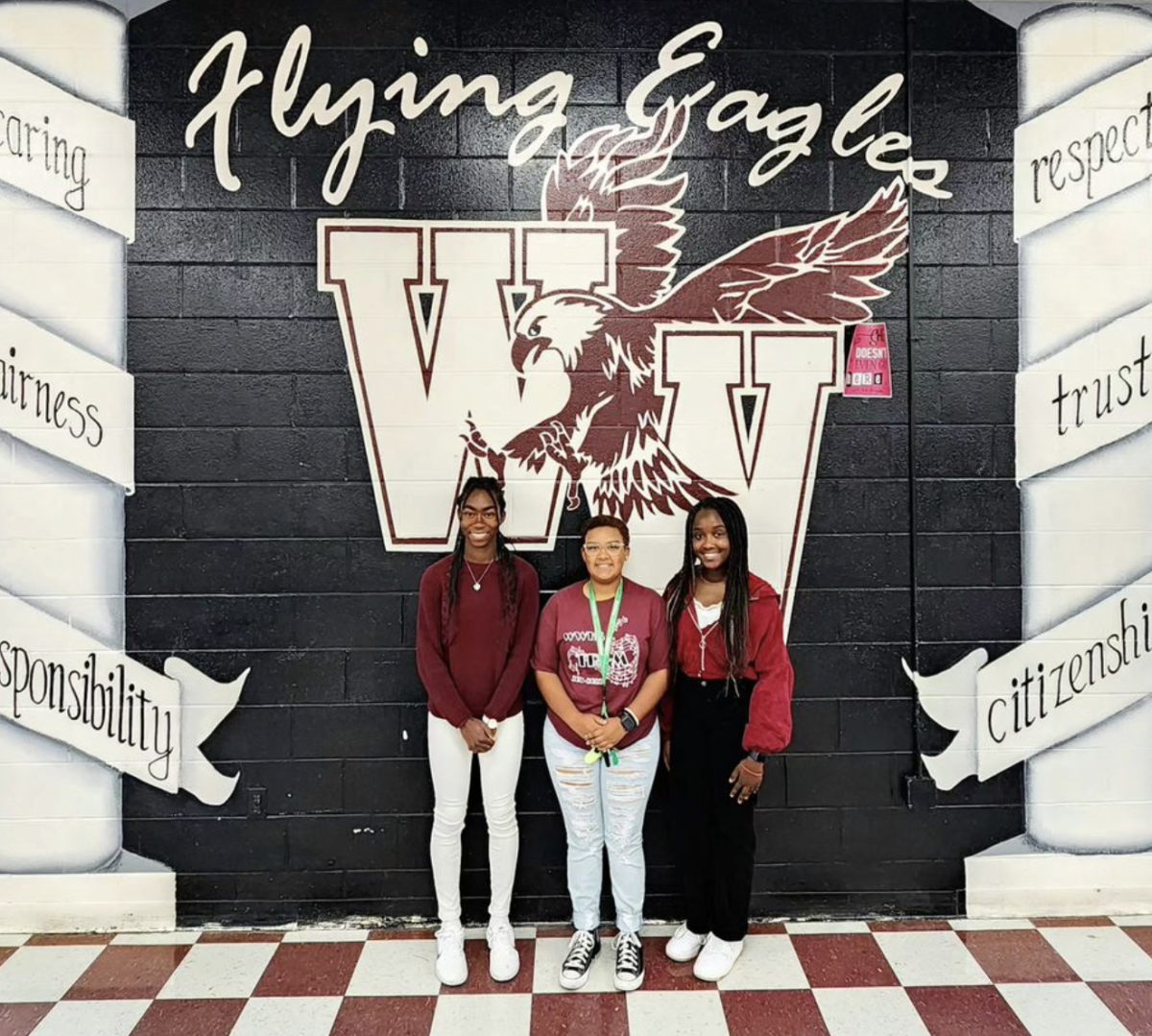 Three Woodrow Wilson High School students are presented with national award.