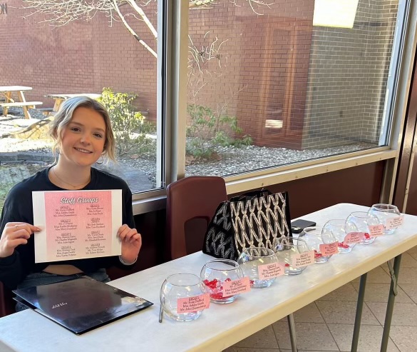 “Let them eat cake!” 
Woodrow’s yearbook staff holds Valentines Day fundraising event. 
