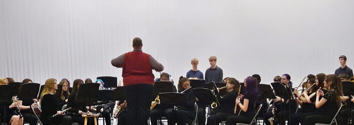 Woodrow Wilson High School band performs in the auditorium.
