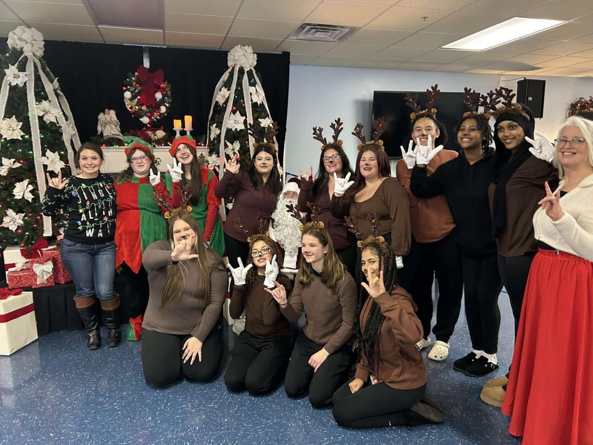 Sign Language Club performing at the Signing Santa event. 